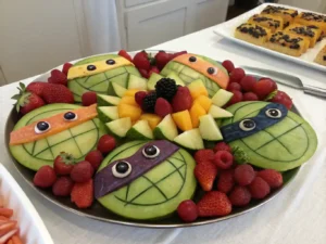 A fun TMNT fruit plate with colorful fruit arrangements.