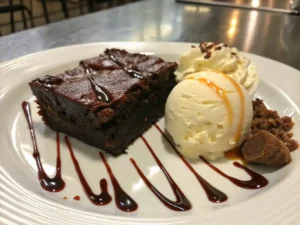 Slice of Mississippi Mud Cake with ice cream